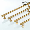 Luxurious brass cabinet pull with a smooth matte finish, perfect for minimalist designs
