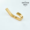 Refined brass hook with a polished surface, adding elegance to any room
