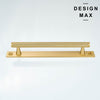 Luxurious Brisa cabinet pull in matte brass with textured grip


