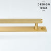 Matte brass cabinet bar pull mounted on sleek backplate

