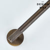 Pair of decorative stainless steel toilet tissue holders with textured tactile grip accents.