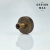 Minimalist brass cabinet hardware with a matte black finish, ideal for a clean and uncluttered look.
