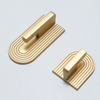 Brass cabinet knobs and pulls, perfect for adding a touch of luxury to your kitchen.
