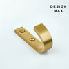 Polished brass wall hook for luxury entryway
