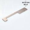 Warm brass appliance handle contrasting beautifully on navy blue cabinetry