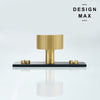 Close-up of Marlowe brass knob with vertical stripes and black base plate

