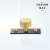 Luxury solid brass cabinet knob with matte gold tone and black backplate

