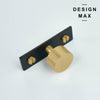 Elegant matte brass cabinet knob with black accent backplate

