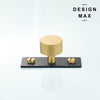 Luxury solid brass cabinet knob with matte gold tone and black backplate

