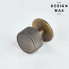 Round antique brass cabinet knob with vertical grooved pattern