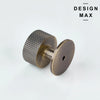 Antique brass Marlowe Pro round cabinet knob with ribbed texture