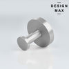 Close-up view of a minimalist round stainless steel wall hook hardware.