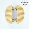modern half moon brass cabinet pull featuring fine linear stripes

