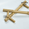 Modern brass cabinet knobs with a curved handle, adding a touch of sophistication
