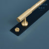 Modern brass cabinet knobs with a brushed nickel finish, creating a sleek and contemporary look
