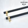 Modern black appliance pull with square edges and gold brass accents.