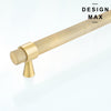Contemporary appliance handles in a soft, matte brass tone with a uniformly textured cylindrical bar and matching hardware. 