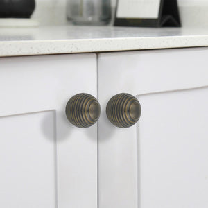 Elegant brass cabinet knob with a polished finish, perfect for a touch of luxury