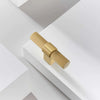 Sleek modern brass cabinet knobs with a polished finish, perfect for a touch of luxury

