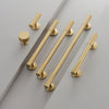 Modern brass cabinet knobs with a brushed nickel finish, creating a sleek and contemporary look.
