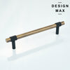 Modern bathroom vanity with matching Tecton brass pulls on marble-front drawers