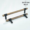 Mixed metal kitchen with brass T-pulls and matte black appliance handles