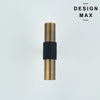 Detailed texture shot of unlacquered brass cabinet pull developing natural patina over time