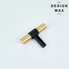 Black matte pantry door with contrasting unlacquered brass T-knob for dramatic effect