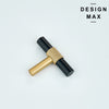 Tecton brass T-pull installed on gray kitchen cabinets in contemporary home