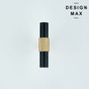 Tecton brass T-pull installed on gray kitchen cabinets in contemporary home