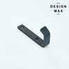 Luxurious brass wall hook with a smooth finish, enhancing minimalist interiors
