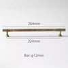 Modern brass cabinet knobs with a brushed nickel finish, creating a sleek and contemporary look.
