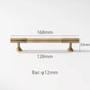 Modern brass cabinet knobs with a curved handle, adding a touch of sophistication.
